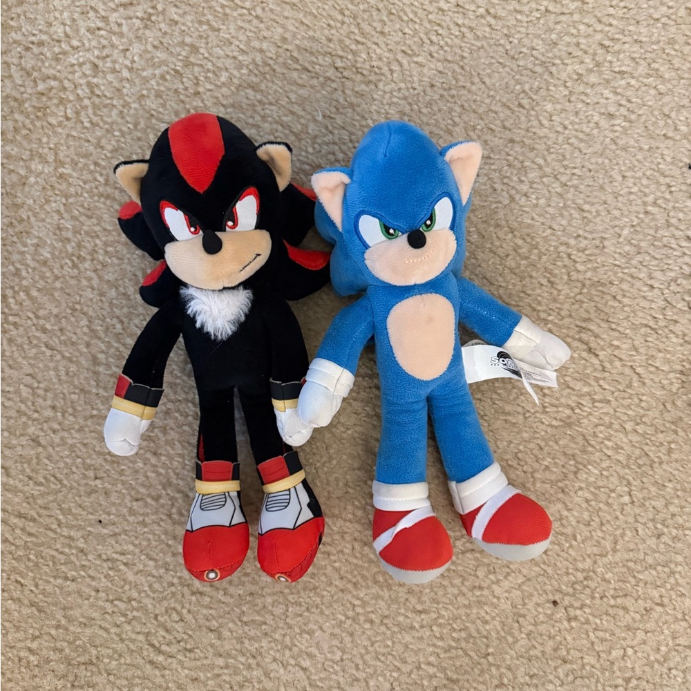 Blue and Black Plush Toy Duo